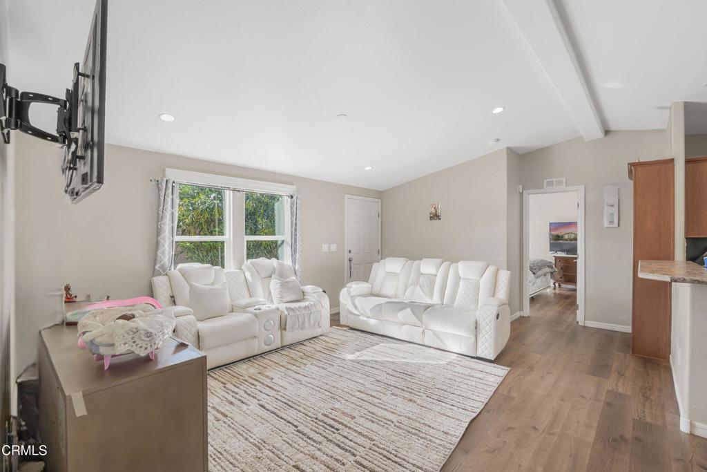 250 East Telegraph Road, Unit 155 Fillmore, CA 93015 - Photo 5 of 39 a living room with furniture and a table