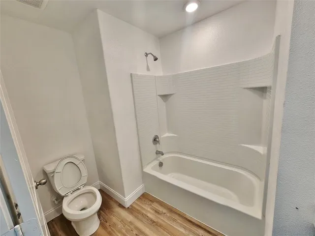 a bathroom with a sink a mirror and vanity