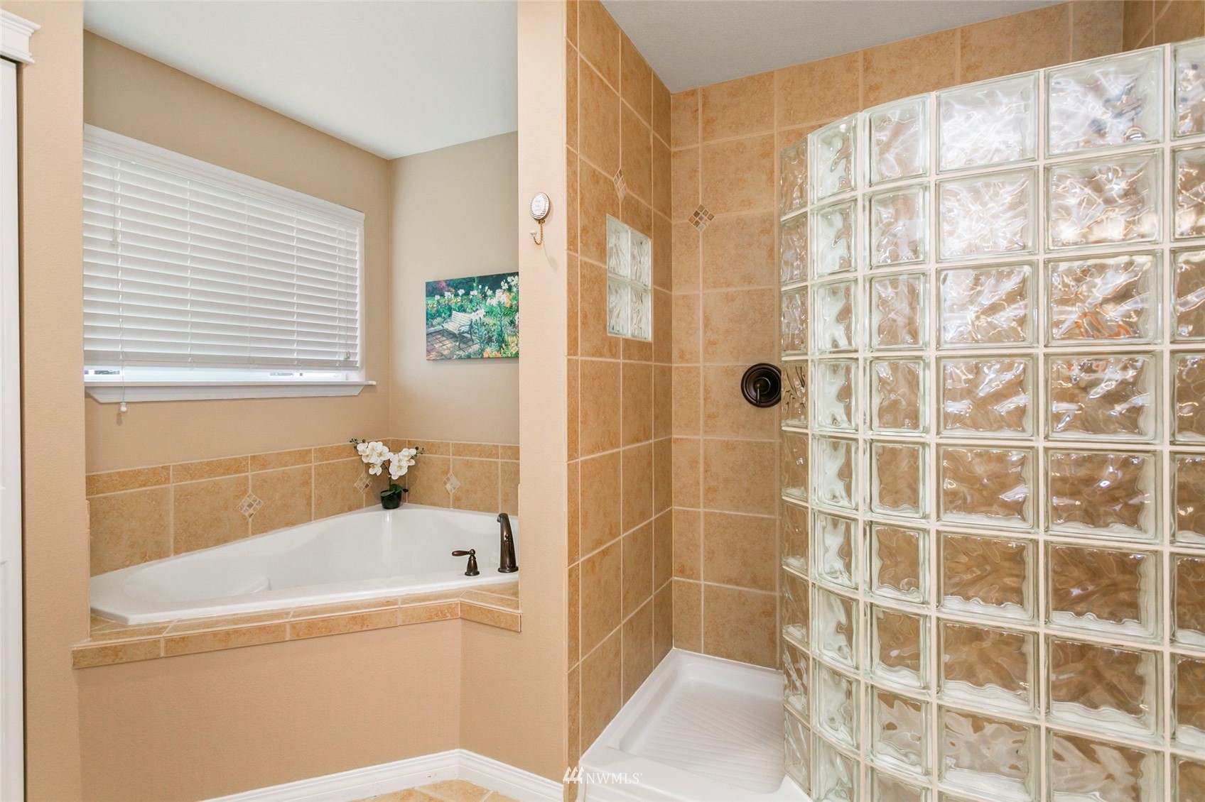 230 161st Place Southeast Bothell, WA 98012 - Photo 13 of 22 a bathroom with sink bathtub and shower
