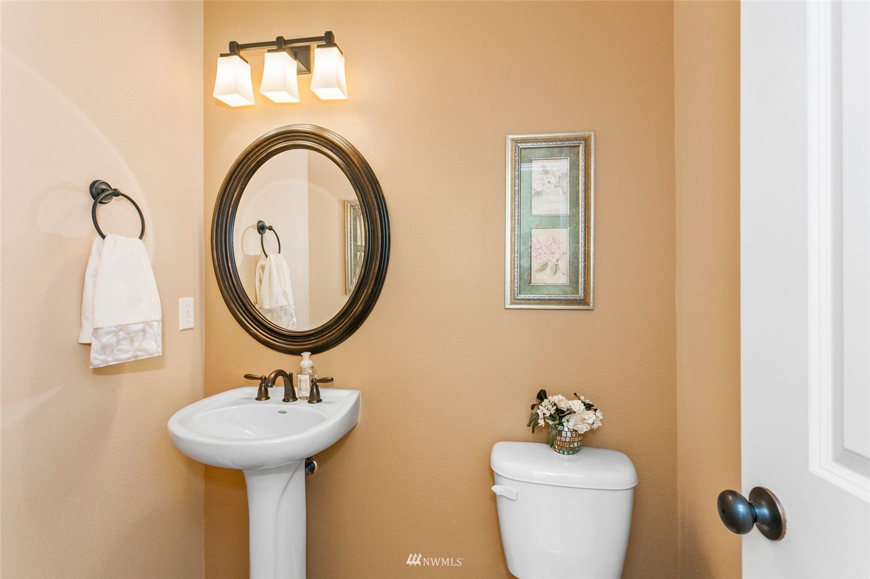 230 161st Place Southeast Bothell, WA 98012 - Photo 8 of 22 a bathroom with a sink mirror and toilet