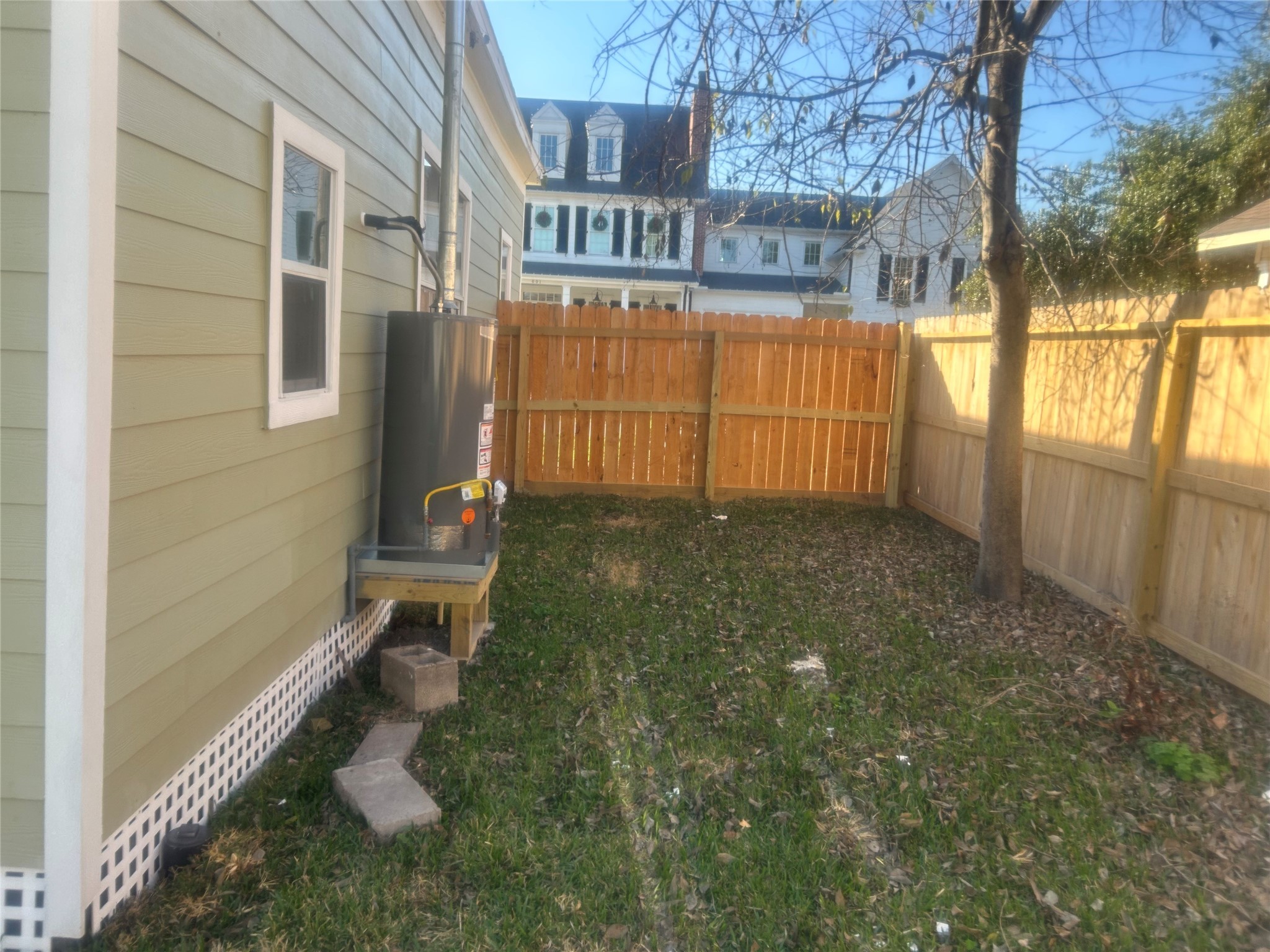 602 Cordell Street Houston, TX 77009 - Photo 11 of 13 a view of a house with a yard