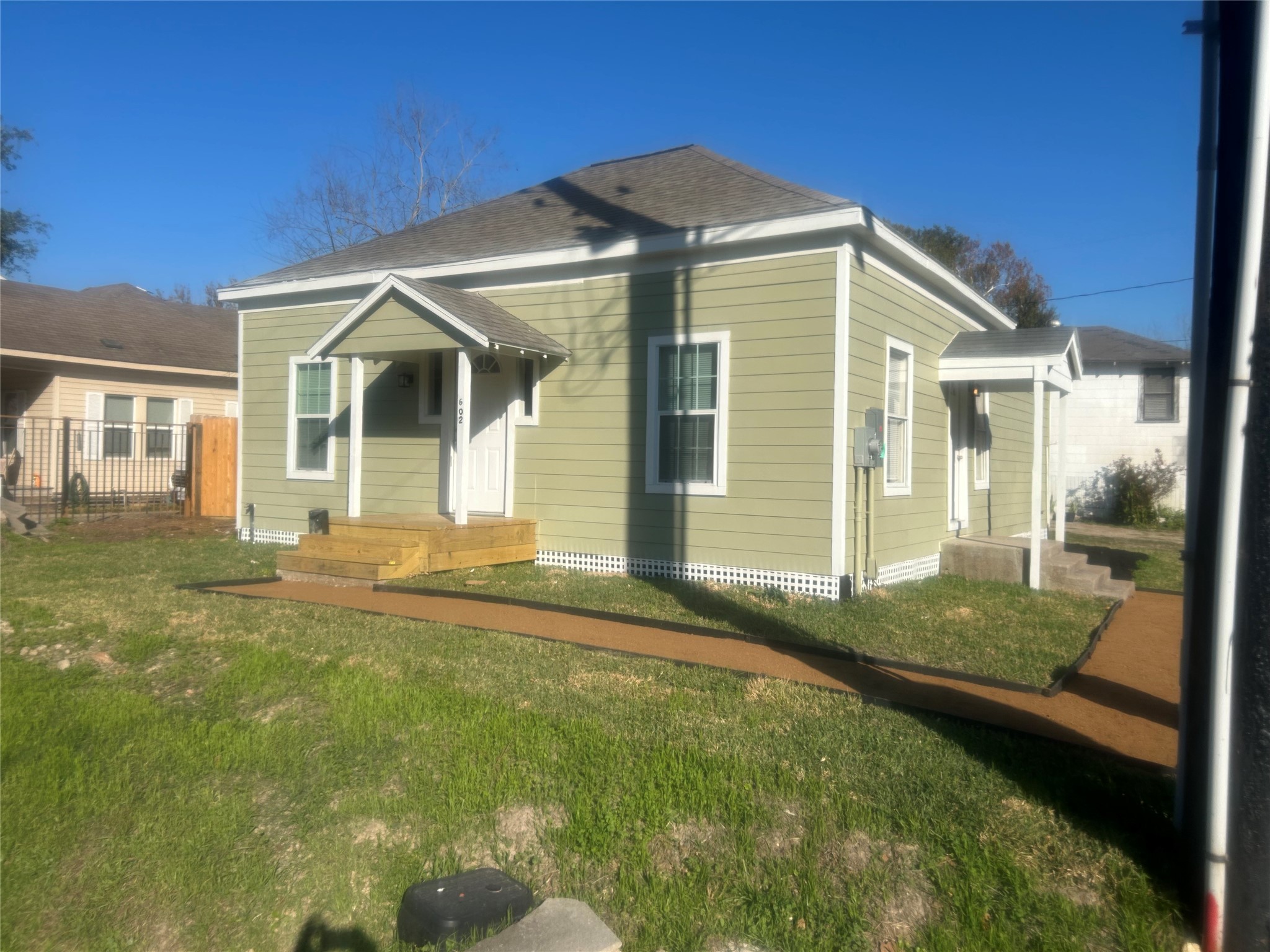 602 Cordell Street Houston, TX 77009 - Photo 13 of 13 a front view of a house with garden