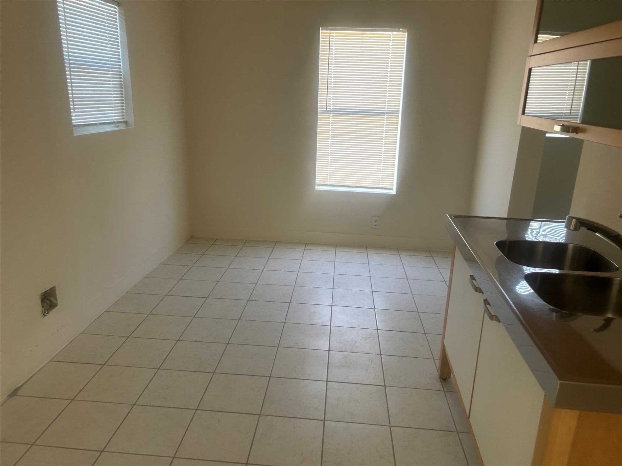 602 Cordell Street Houston, TX 77009 - Photo 5 of 13 a kitchen with granite countertop a sink a granite counter tops and a window