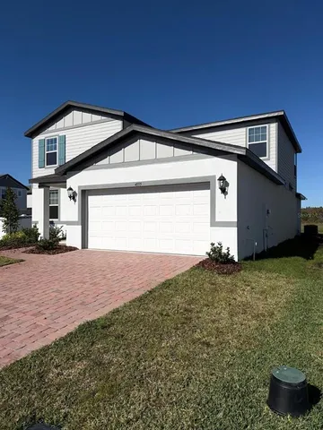 a front view of house with yard