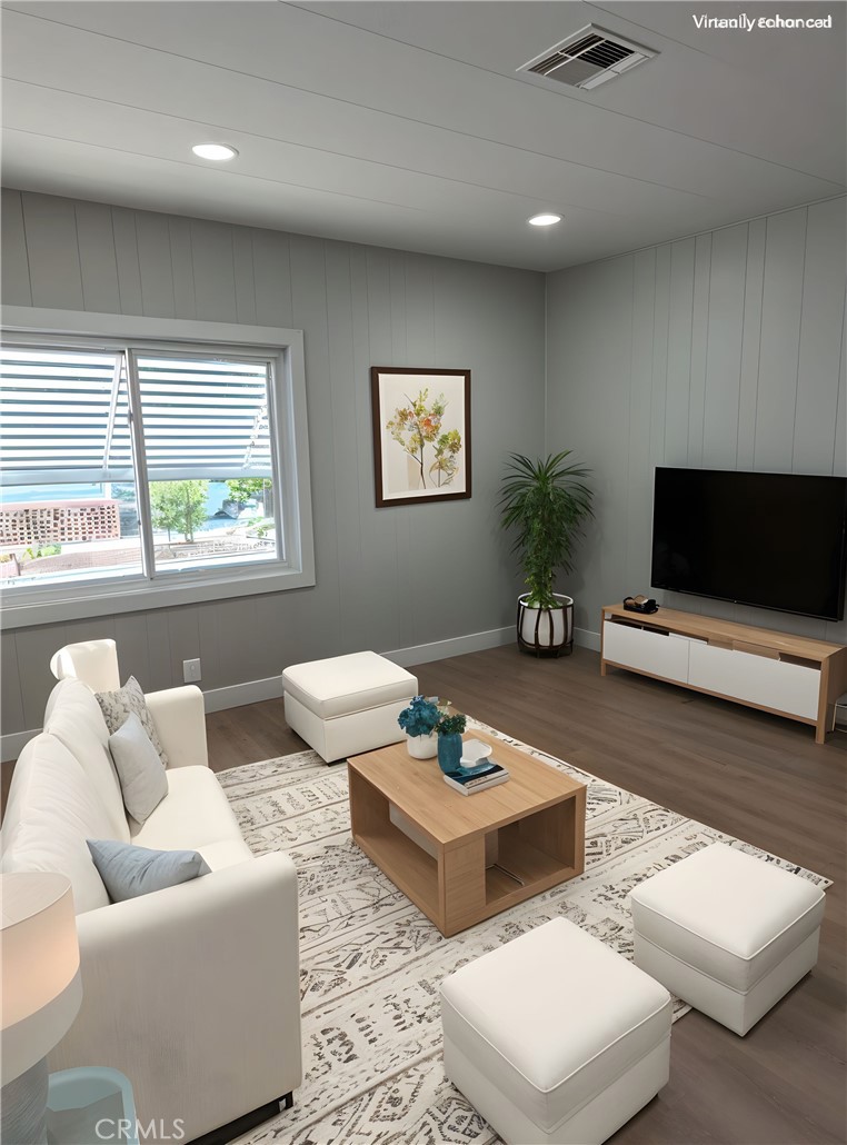 620 Lake Ridge Way, Unit 45 La Habra, CA 90631 - Photo 1 of 21 a living room with furniture and a flat screen tv