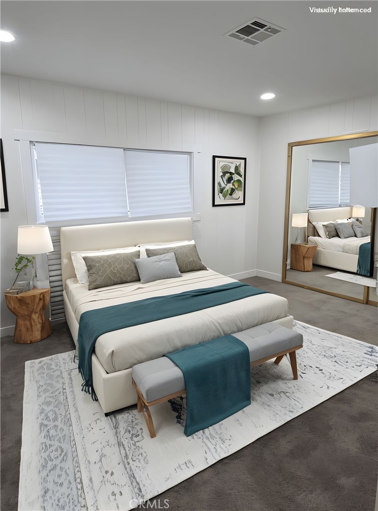 620 Lake Ridge Way, Unit 45 La Habra, CA 90631 - Photo 15 of 21 a bedroom with furniture and a couch