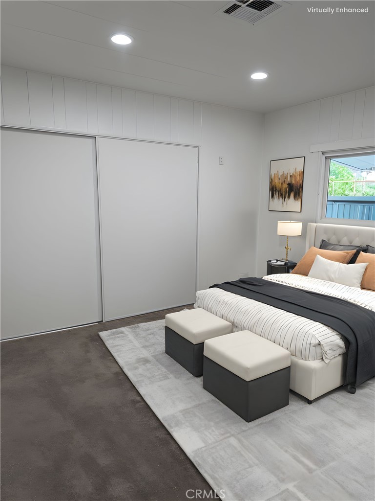 620 Lake Ridge Way, Unit 45 La Habra, CA 90631 - Photo 17 of 21 a bedroom with a bed and a window