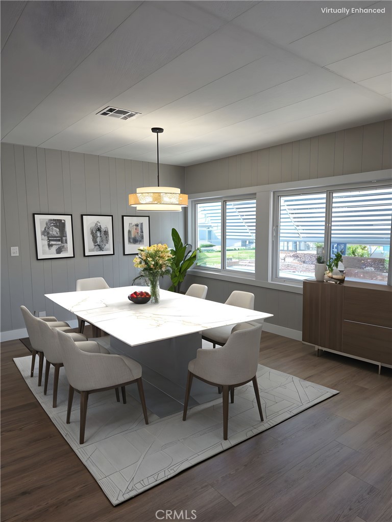 620 Lake Ridge Way, Unit 45 La Habra, CA 90631 - Photo 2 of 21 a dining room with wooden floor and large windows