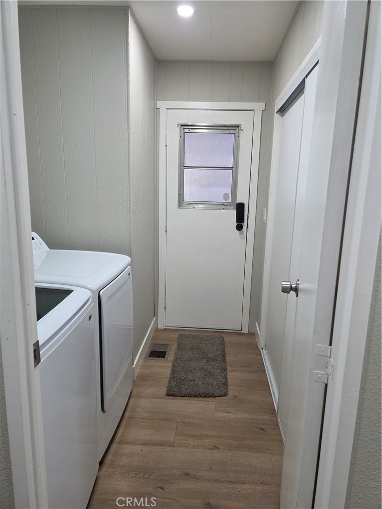 620 Lake Ridge Way, Unit 45 La Habra, CA 90631 - Photo 21 of 21 a view of a hallway with washer and dryer