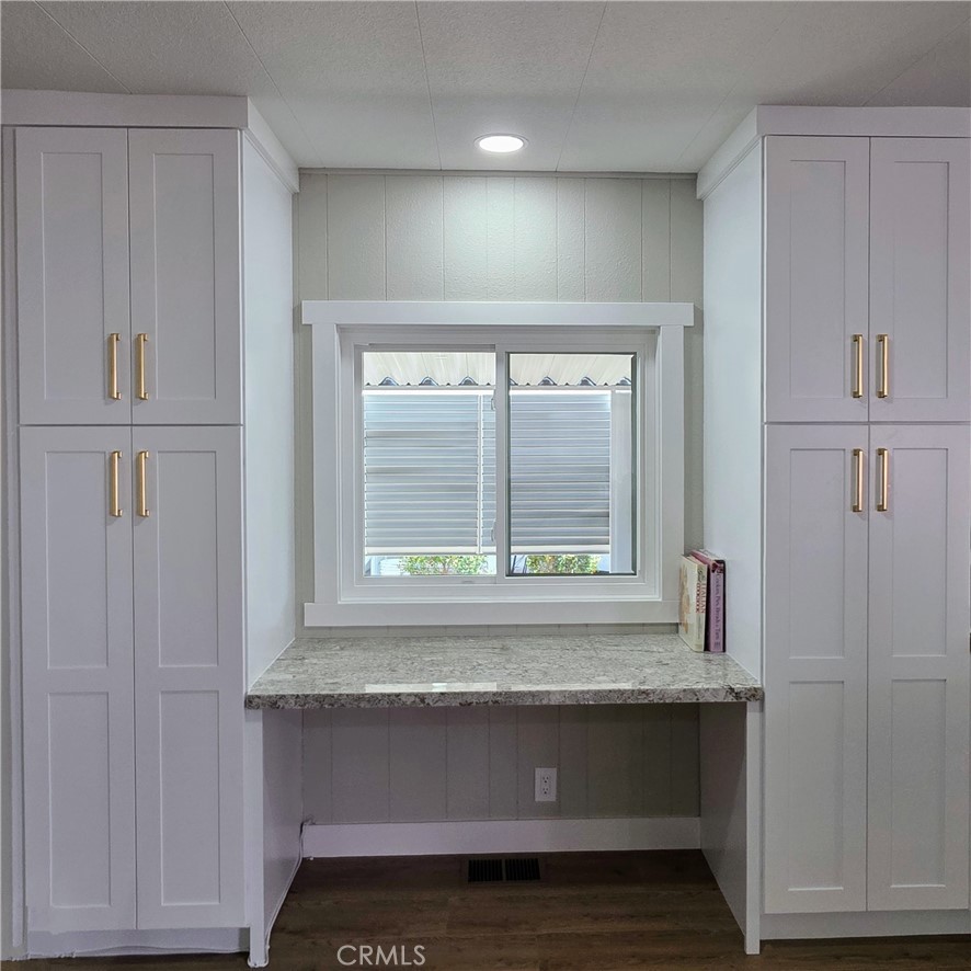 620 Lake Ridge Way, Unit 45 La Habra, CA 90631 - Photo 7 of 21 a view of kitchen with granite countertop cabinets and window