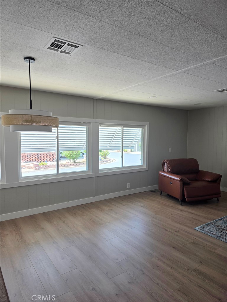 620 Lake Ridge Way, Unit 45 La Habra, CA 90631 - Photo 10 of 21 a living room with furniture and a window