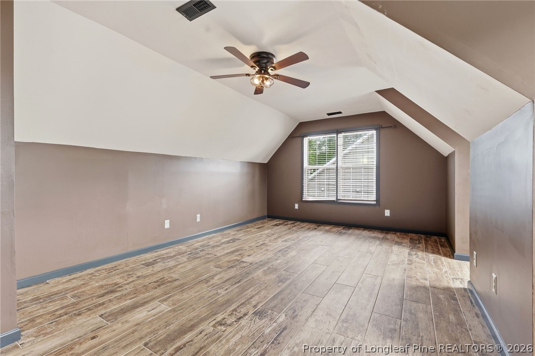 5113 Archer Road Hope Mills, NC 28348 - Photo 22 of 41 an empty room with windows and fan