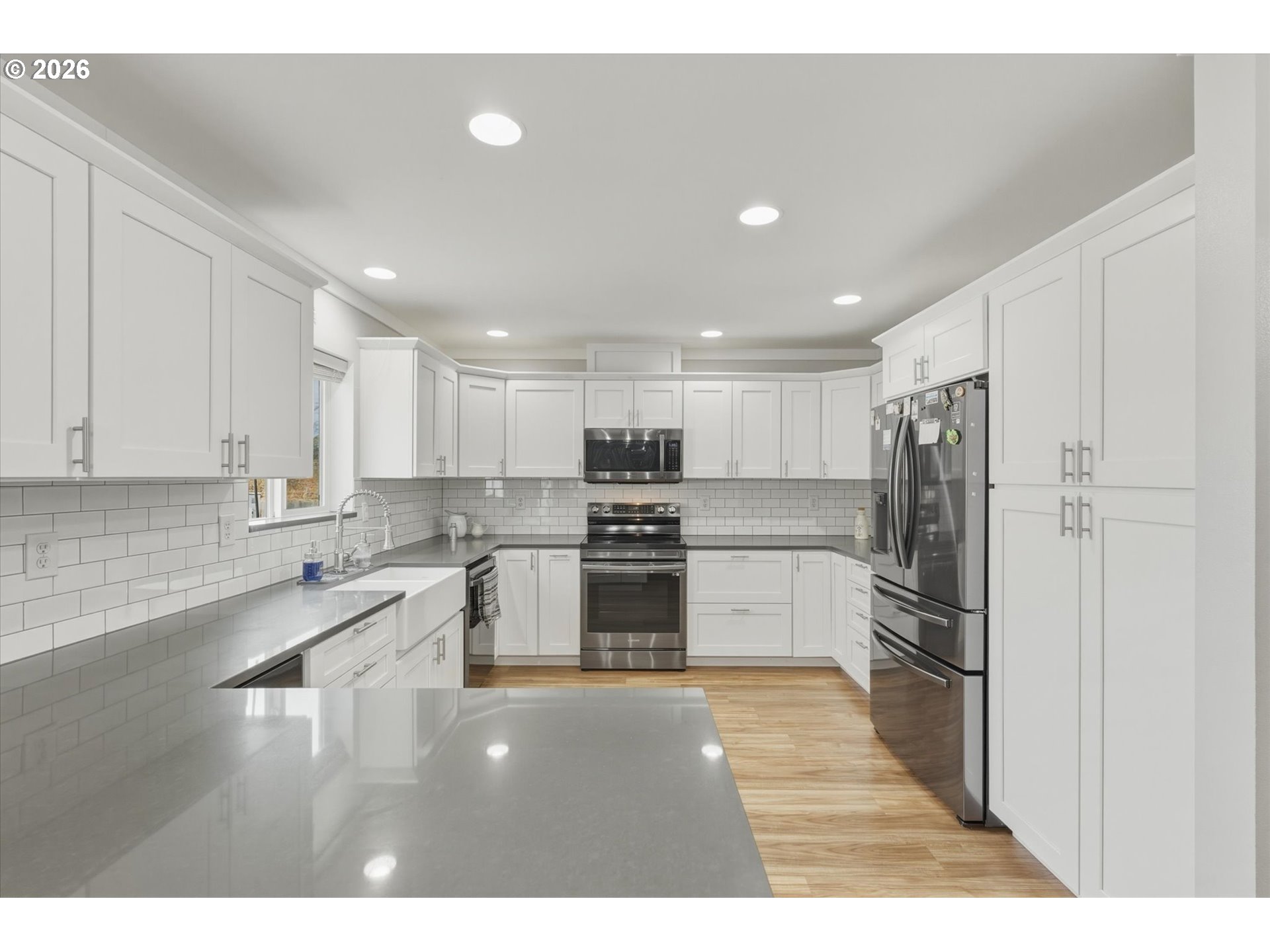 232 Shoreview Drive Kelso, WA 98626 - Photo 12 of 43 a kitchen with a refrigerator and a sink