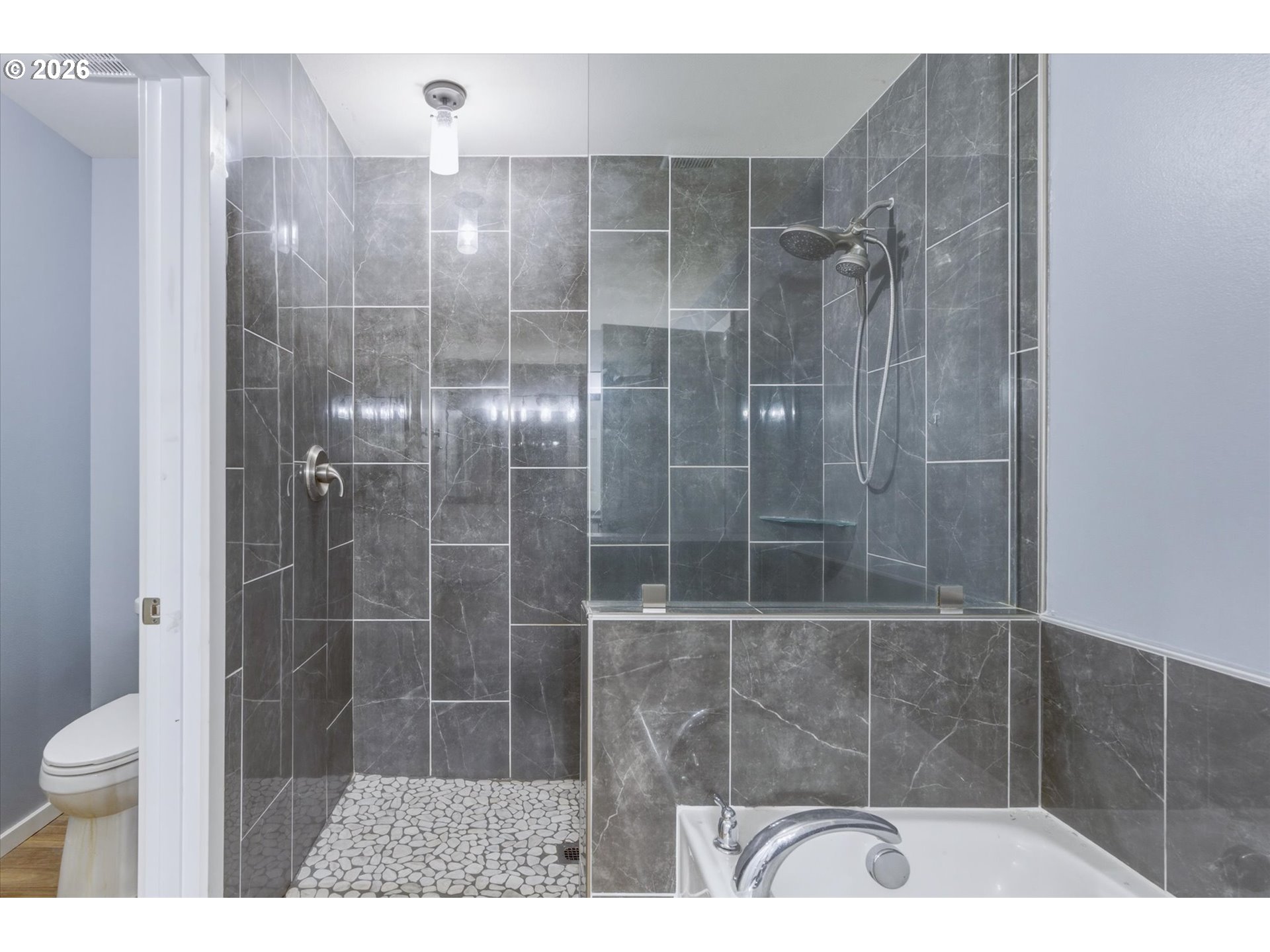 232 Shoreview Drive Kelso, WA 98626 - Photo 26 of 43 a bathroom with a shower and a toilet