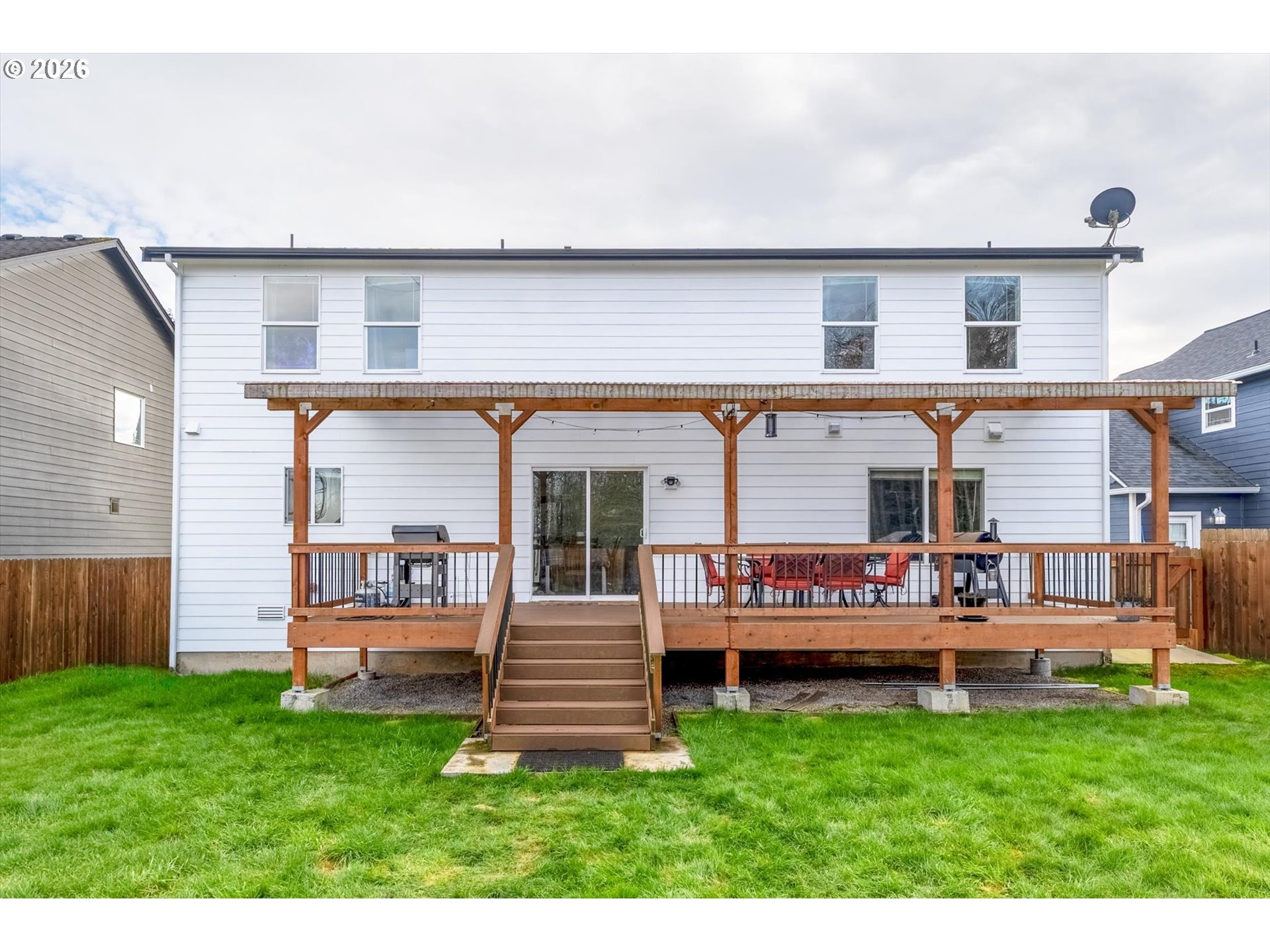232 Shoreview Drive Kelso, WA 98626 - Photo 35 of 43 a backyard of a house with barbeque oven and a yard