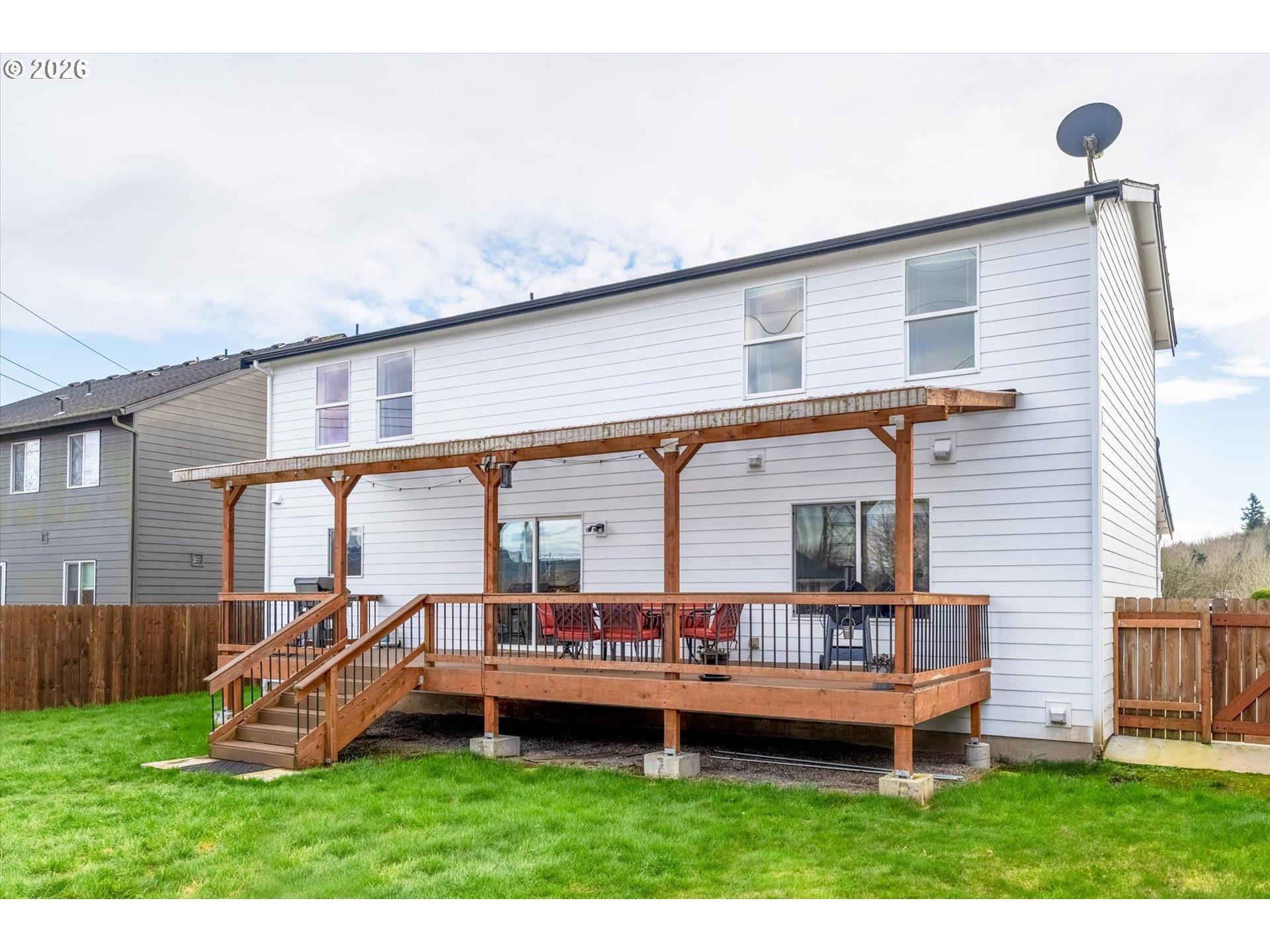 232 Shoreview Drive Kelso, WA 98626 - Photo 36 of 43 a view of a house with a backyard and porch