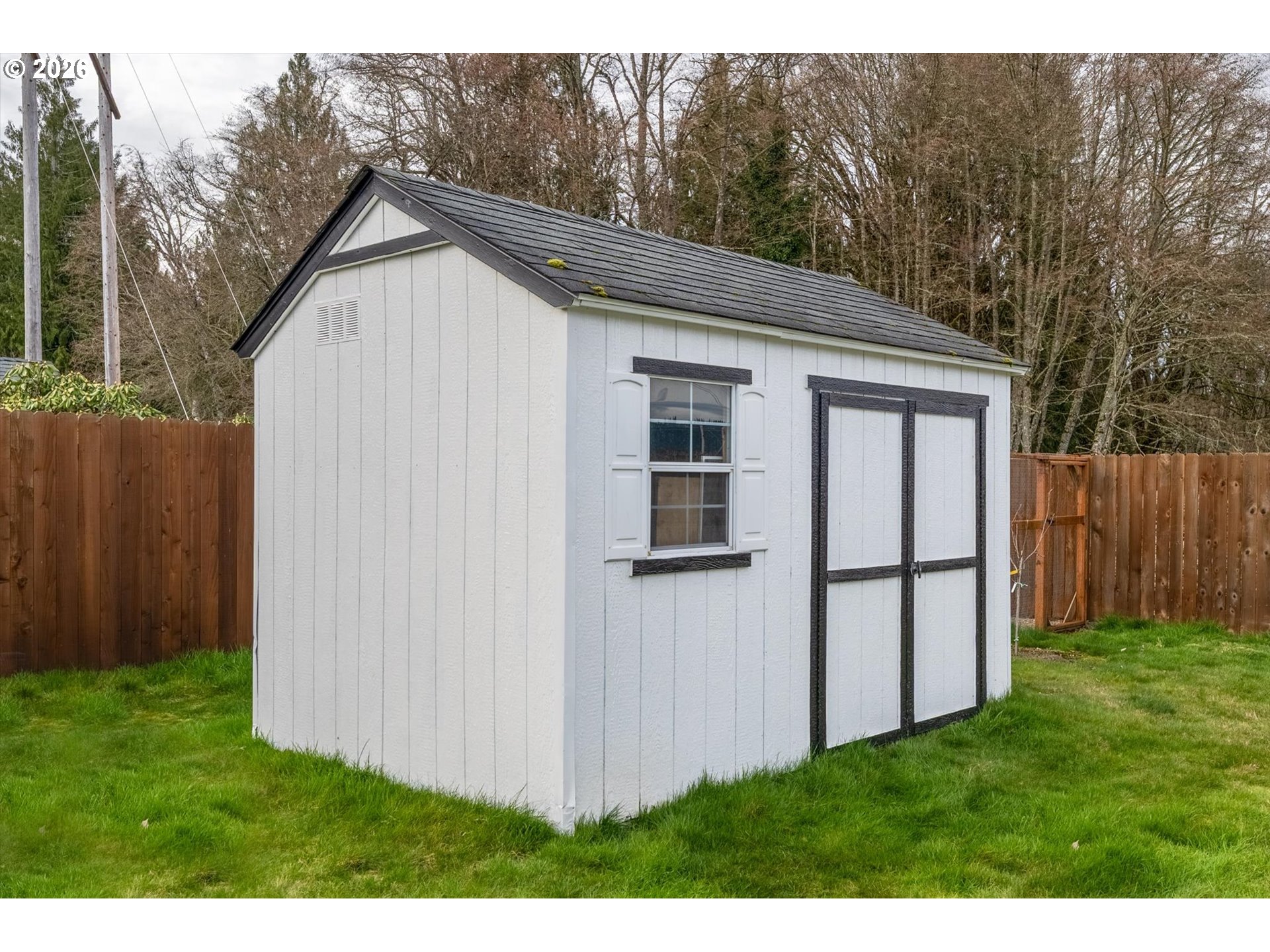 232 Shoreview Drive Kelso, WA 98626 - Photo 39 of 43 a view of backyard of house with wooden fence
