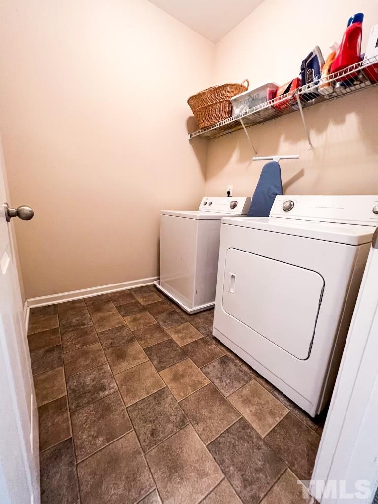 1108 Ileagnes Road Raleigh, NC 27603 - Photo 22 of 30 a utility room with dryer and washer