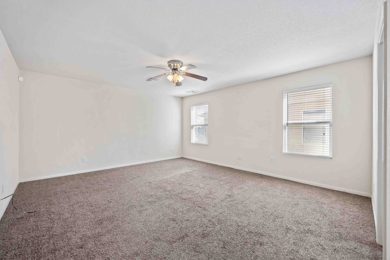 7126 Fox Scene Drive Humble, TX 77338 - Photo 15 of 33 Primary bedroom