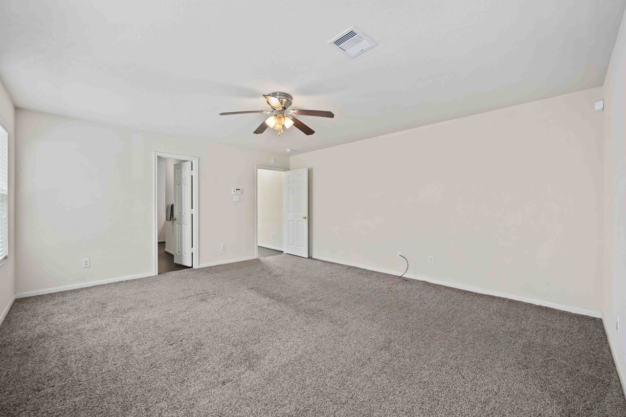 7126 Fox Scene Drive Humble, TX 77338 - Photo 17 of 33 Primary bedroom