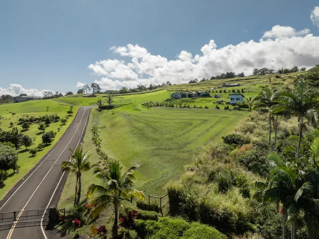 a view of swimming pool from a balcony
