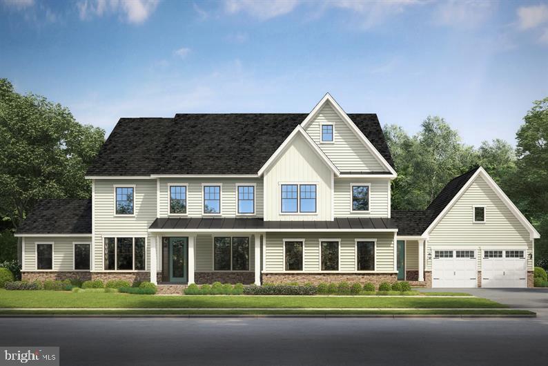 23303 Lansing Woods Lane, Unit C Aldie, VA 20105 - Photo 1 of 70 a front view of a house with a yard