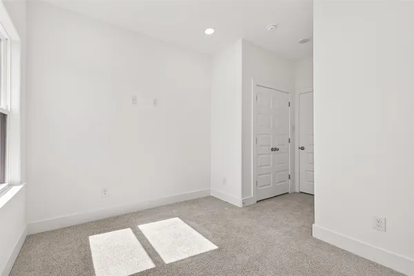 an empty room with a workbench