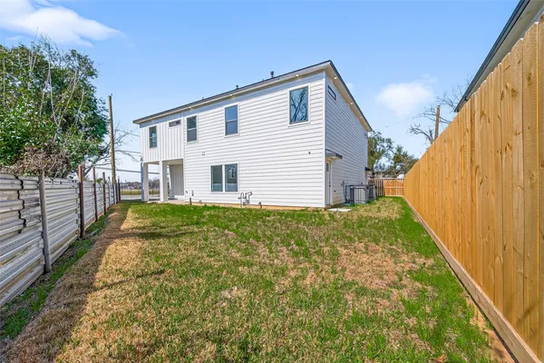 a view of backyard with cabin