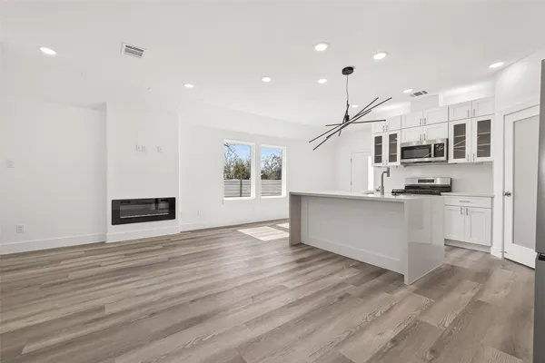 a view of entryway with wooden floor