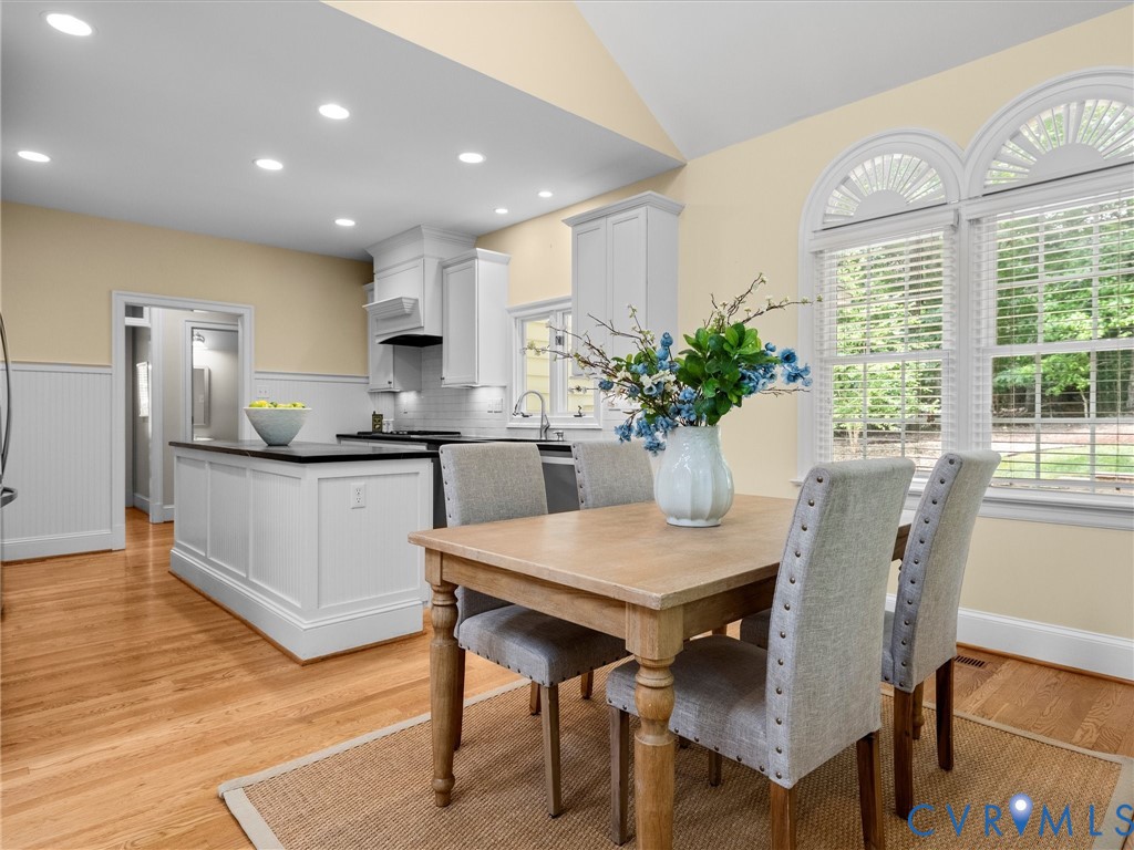 2011 Gamelaw Court Midlothian, VA 23113 - Photo 28 of 77 a kitchen with a table and chairs in it