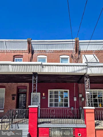 a front view of a building with glass windows