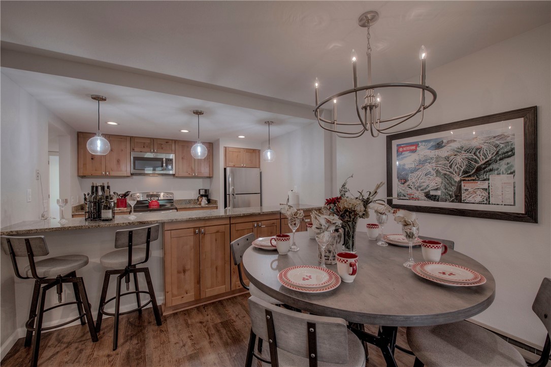 22097 Saints John Road, Unit 2510 Keystone, CO 80435 - Photo 6 of 35 Dining to Kitchen