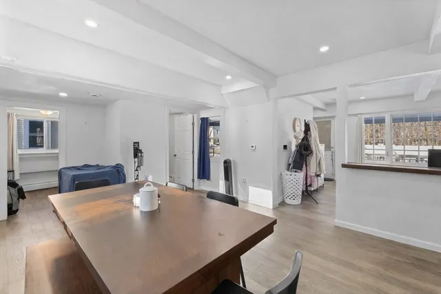 a kitchen with granite countertop stainless steel appliances and a refrigerator