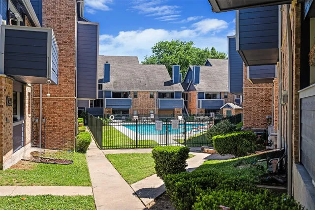 a view of a house with a swimming pool