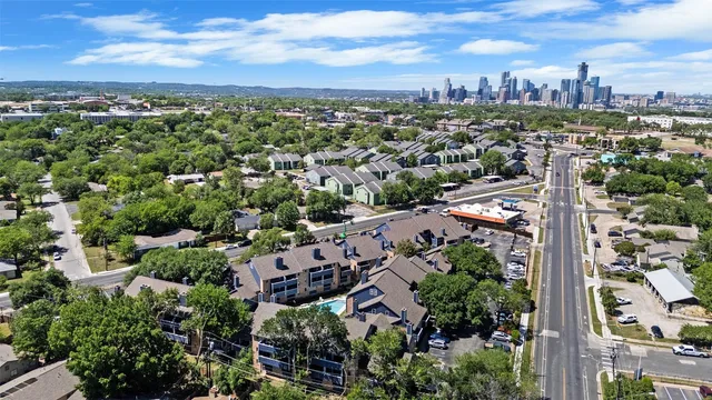 an aerial view of a city with lots of residential buildings