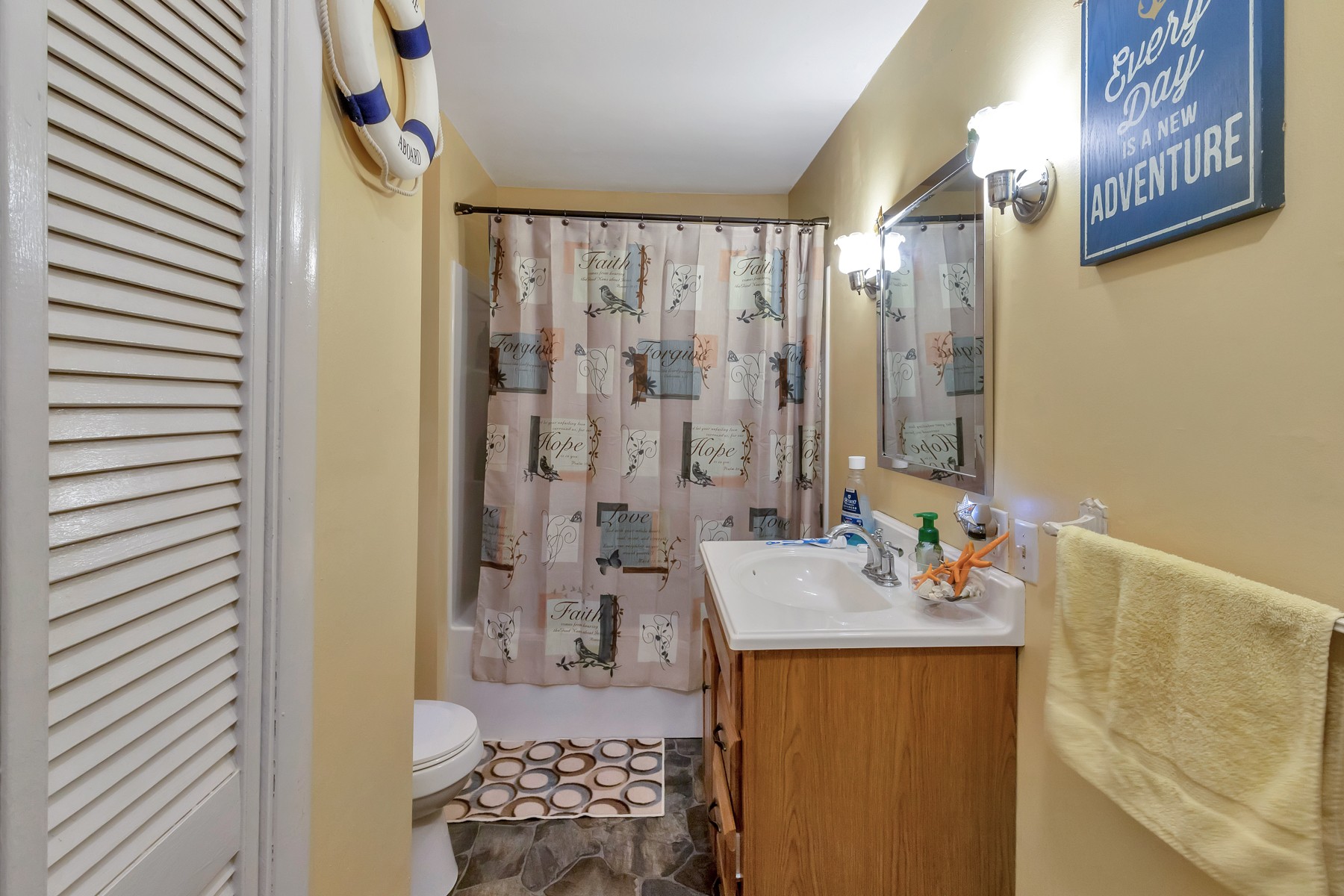 5970 South Lamont Road Springfield, TN 37172 - Photo 11 of 15 a bathroom with a sink mirror and shower