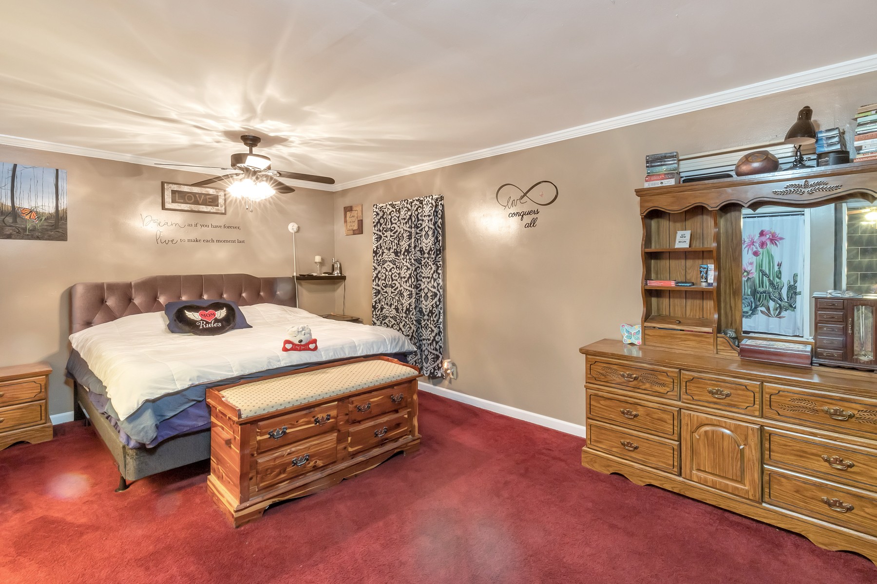 5970 South Lamont Road Springfield, TN 37172 - Photo 7 of 15 a bedroom with a bed and a dresser