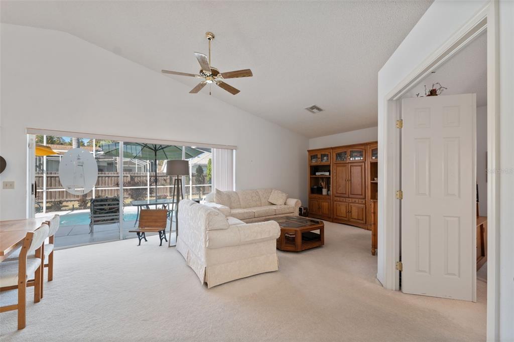 5301 El Cerro Drive New Port Richey, FL 34655 - Photo 9 of 31 a living room with furniture and a window