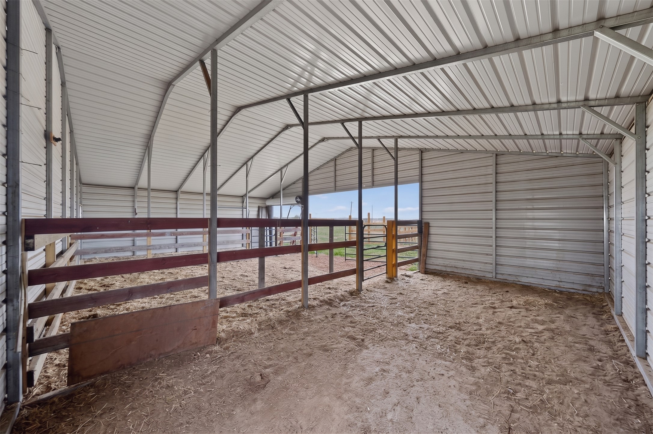 664 Garrett Road Yoakum, TX 77995 - Photo 18 of 39 Metal-framed structure featuring a corrugated metal roof and siding, providing covered space
