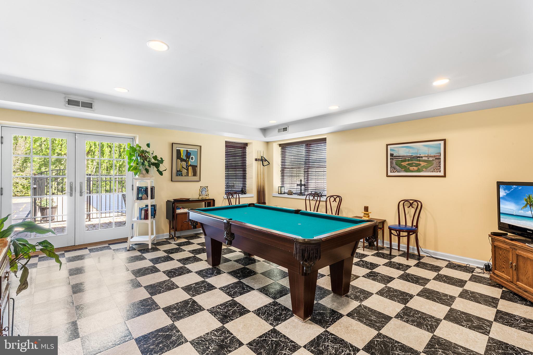 401 North Rolling Road Springfield, PA 19064 - Photo 41 of 79 a room with pool table and glass windows