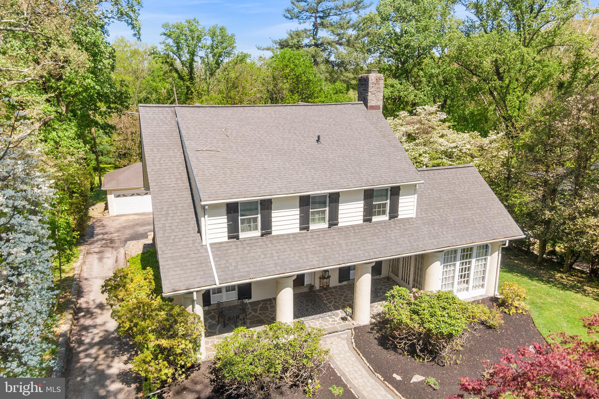 401 North Rolling Road Springfield, PA 19064 - Photo 70 of 79 aerial view of a house with a yard and potted plants