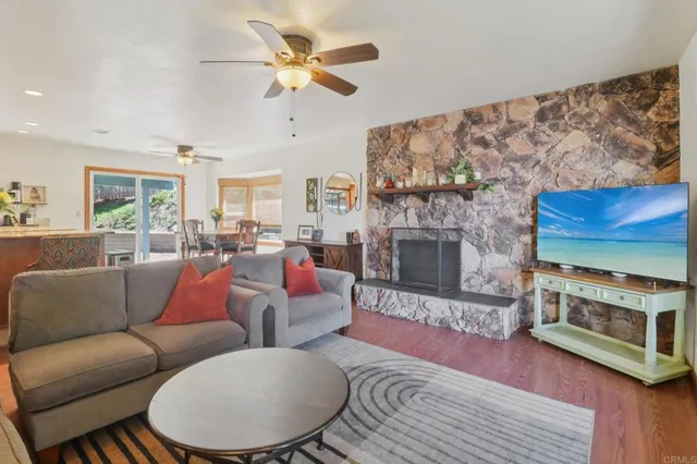 a dining area with furniture and window