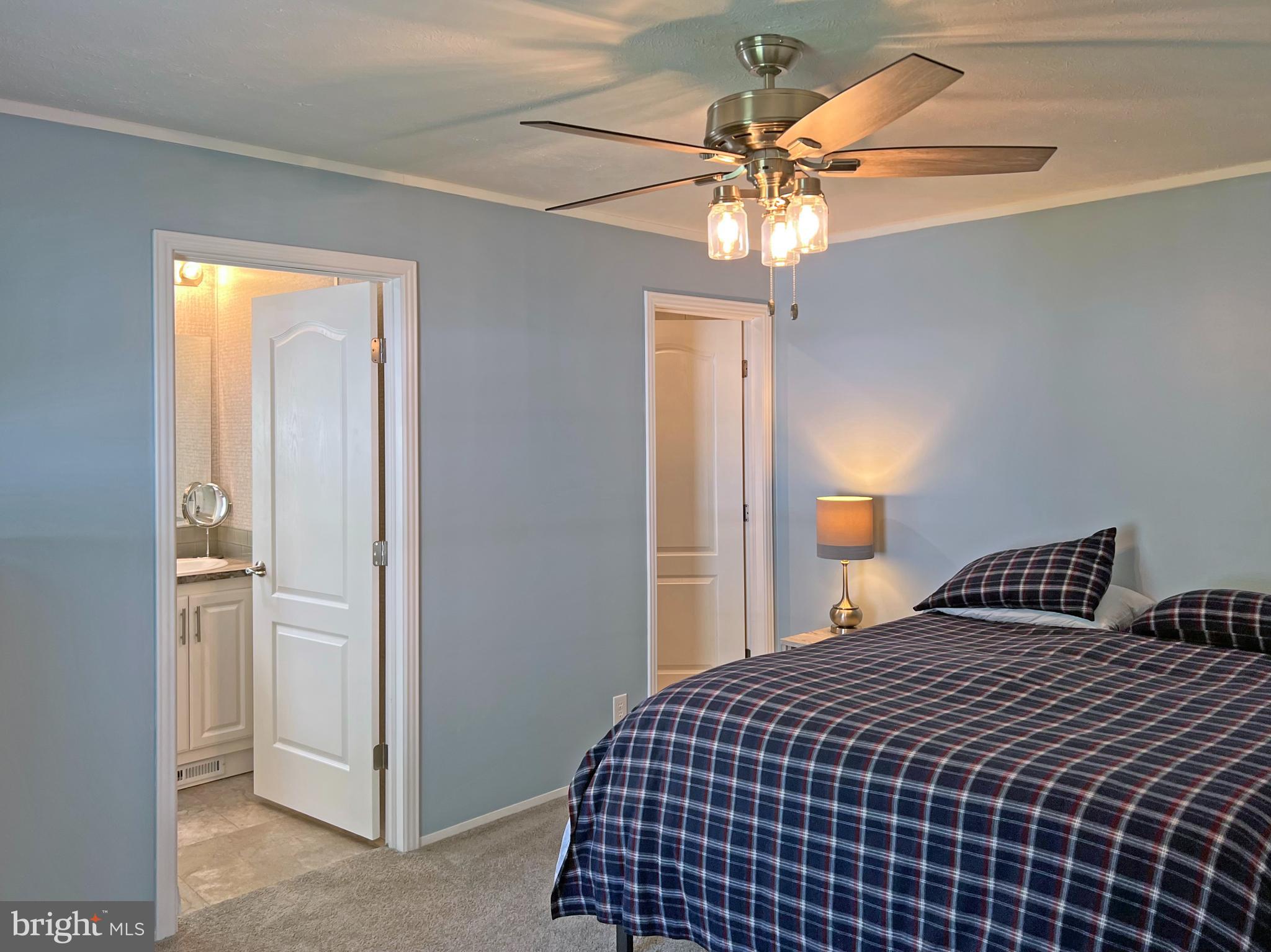 17217 Ridge Line Drive, Unit 72 Lewes, DE 19958 - Photo 11 of 34 En Suite Main Bedroom with a Walk-In Closet