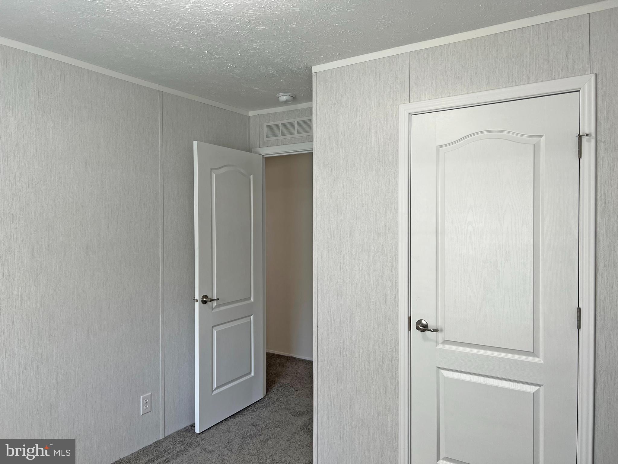 17217 Ridge Line Drive, Unit 72 Lewes, DE 19958 - Photo 18 of 34 Third Bedroom with Standard Closet