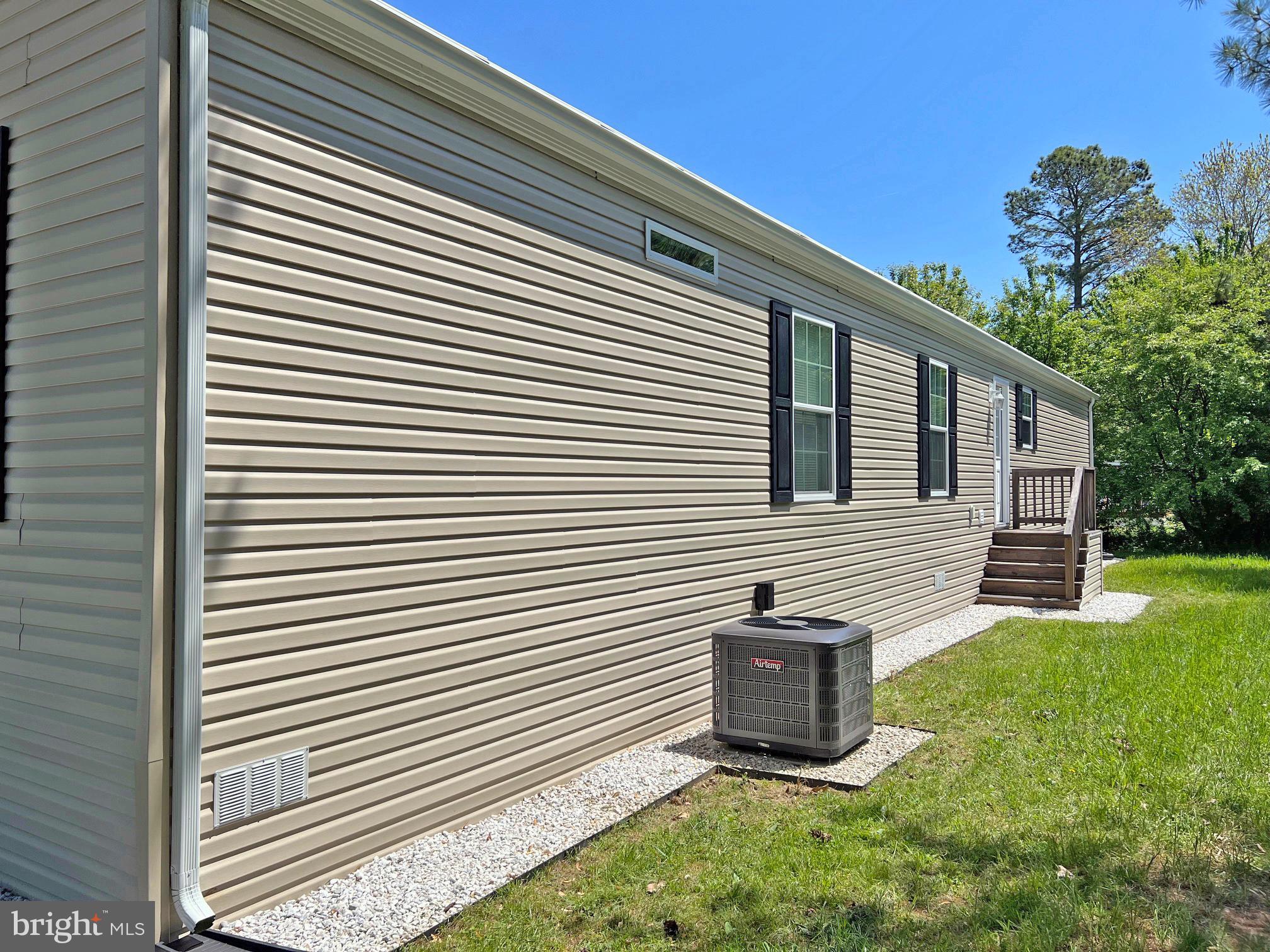 17217 Ridge Line Drive, Unit 72 Lewes, DE 19958 - Photo 29 of 34 Side View