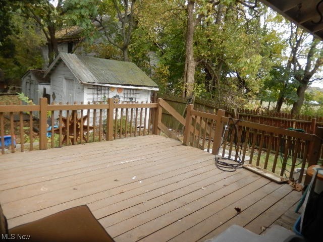 1302 Duncan Street Southwest Massillon, OH 44647 - Photo 21 of 22 Wooden terrace with a storage shed