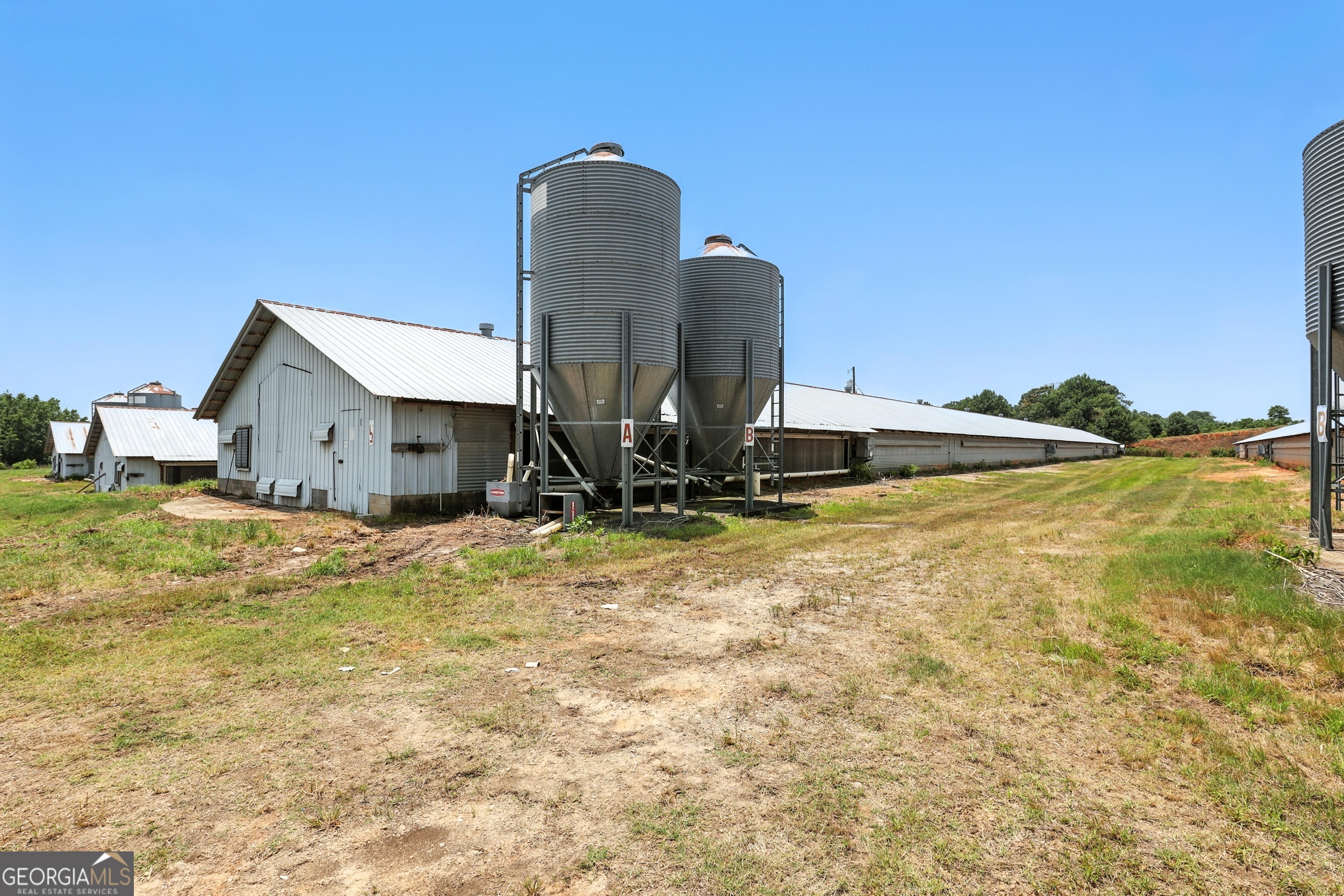 334 Brock Road Toccoa, GA 30577 - Photo 16 of 17 a view of a house with backyard and sitting area