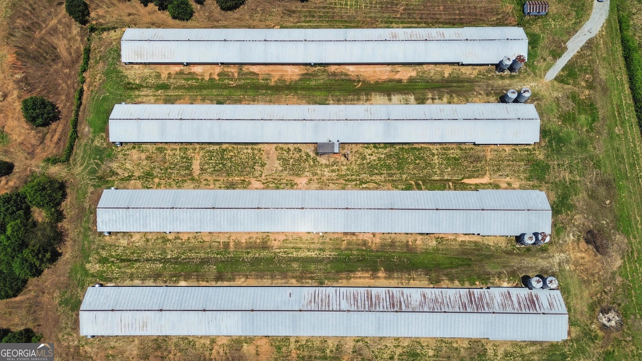334 Brock Road Toccoa, GA 30577 - Photo 8 of 17 a view of a back yard of the house and a lake view