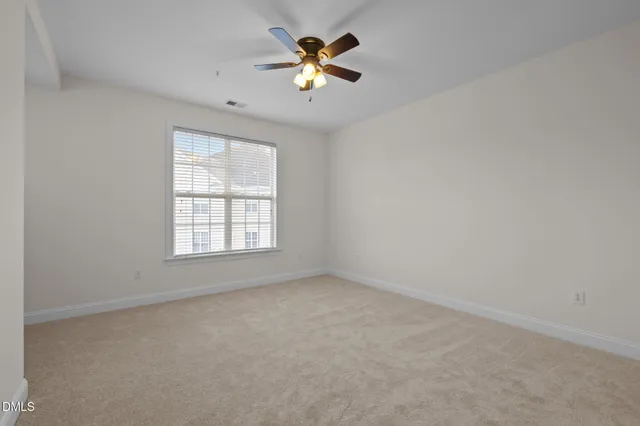 a view of small space with wooden floor