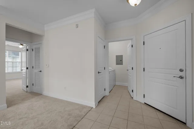 an aerial view of a house with a lake view